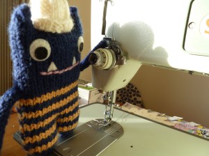 Explorer Beastie Checks the Sewing Machine - CrawCrafts Beasties