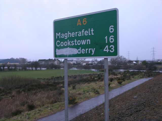 Road sign, Derry/Londonderry - Photo by SeanMack, via Wikipedia