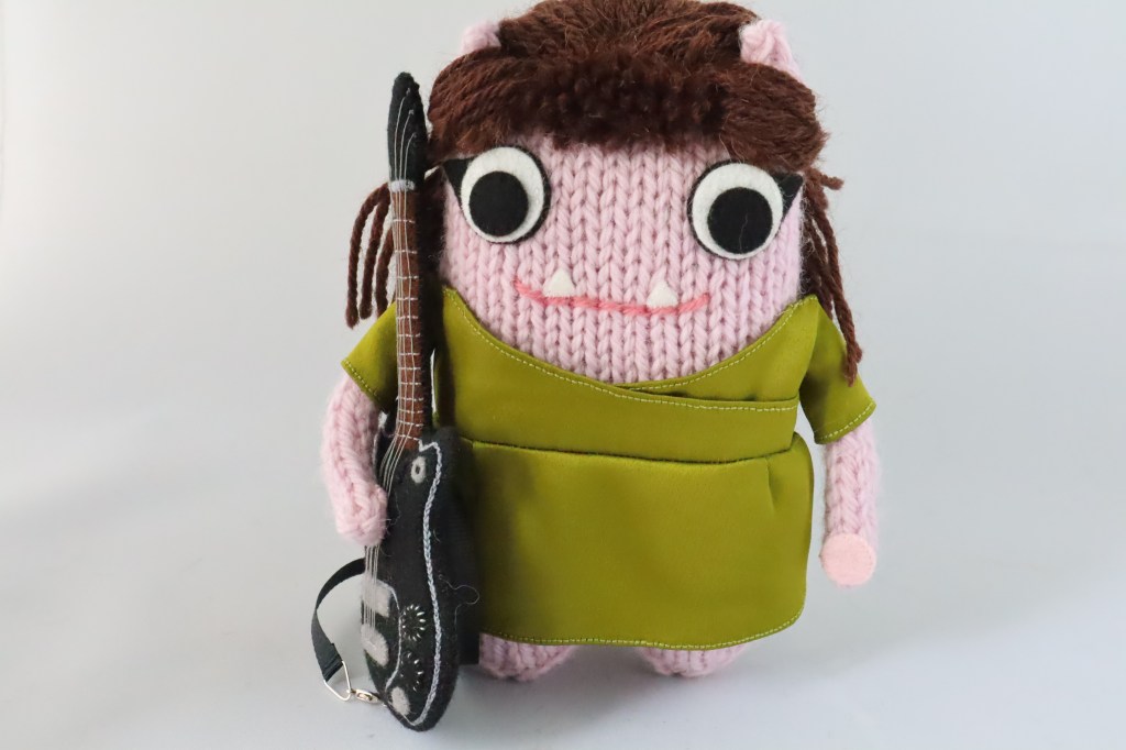 Holding Guitar - CrawCrafts Beasties