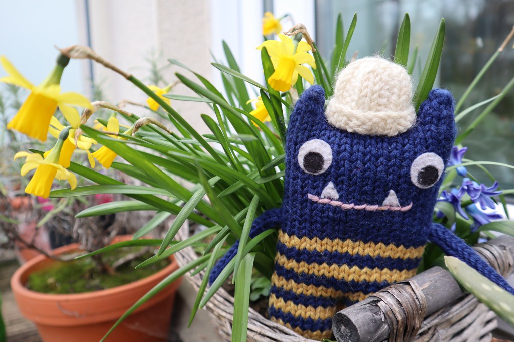 Explorer Beastie with Spring Daffodils - CrawCrafts Beasties