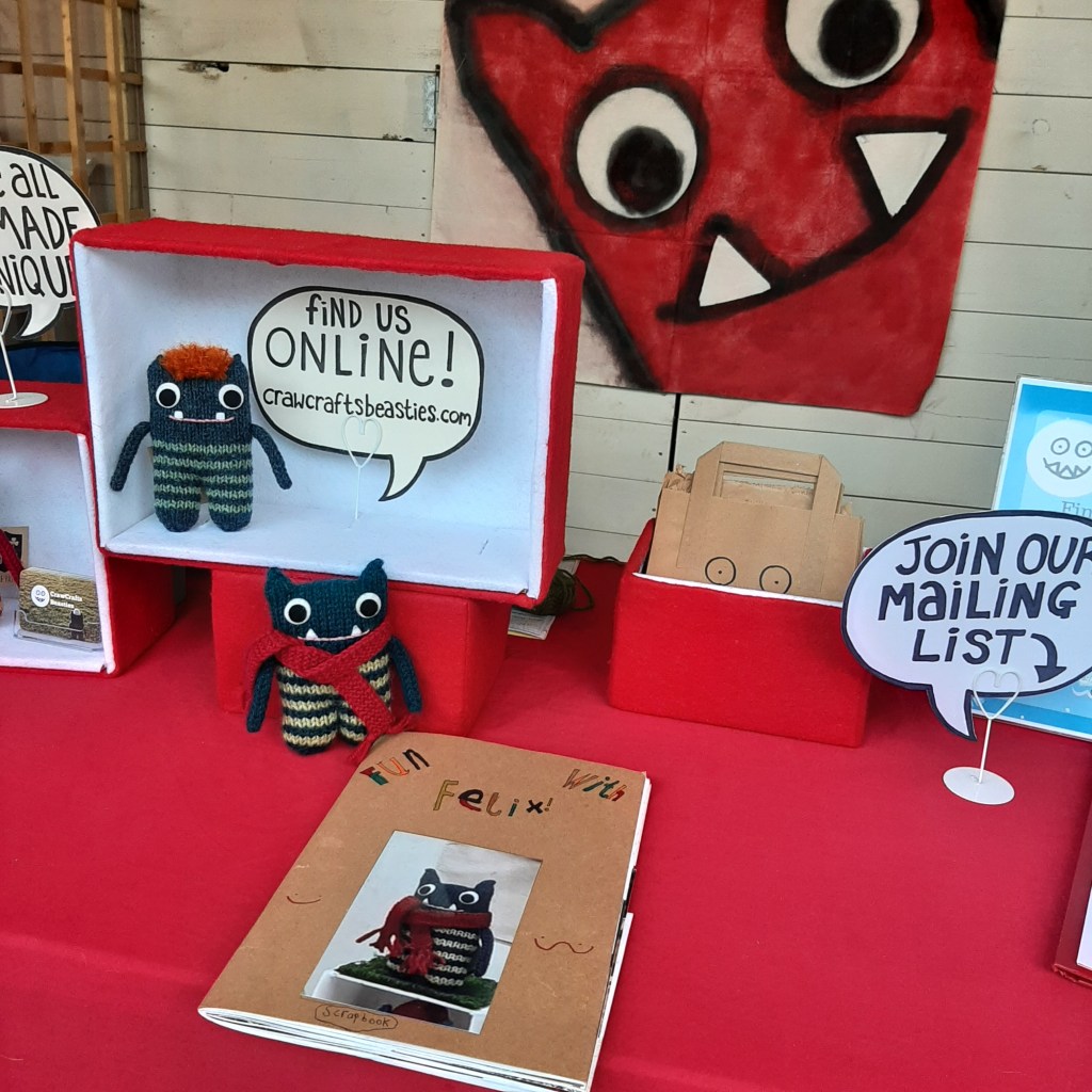 Felix Beastie with his amazing photo scrapbook - CrawCrafts Beasties